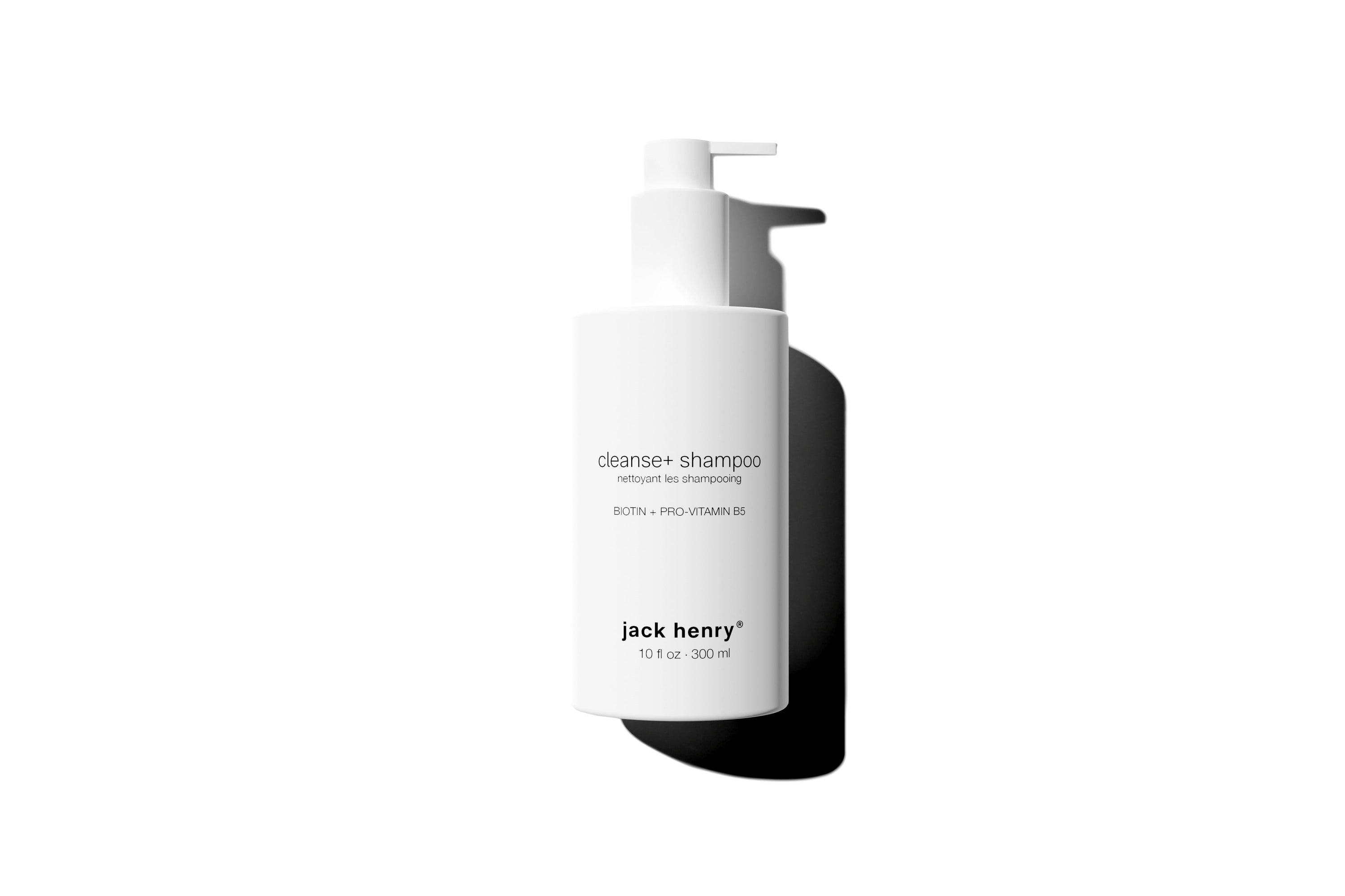 Jack Henry Cleanse+ Shampoo. Bottle with minimalist packaging, highlighting its clean and organic formulation.